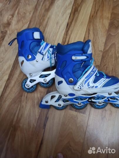 Роликовые коньки