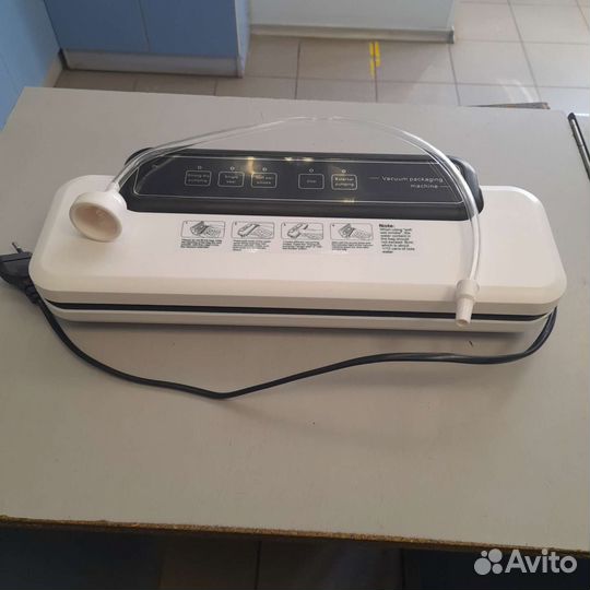 Вакуумный упаковщик