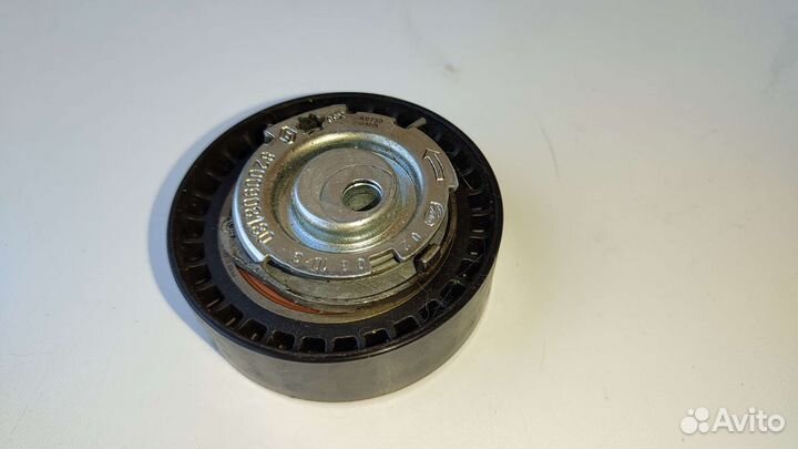 Ролик ремня грм на Renault Logan