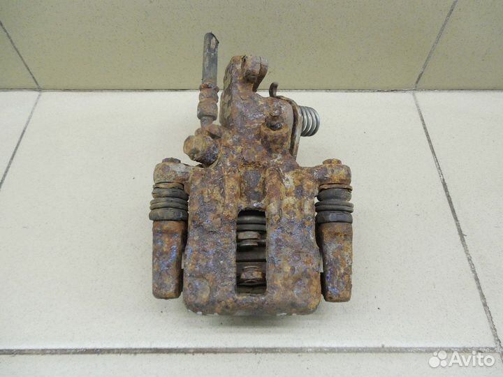 Суппорт задний правый Primera P11E 1996-2002