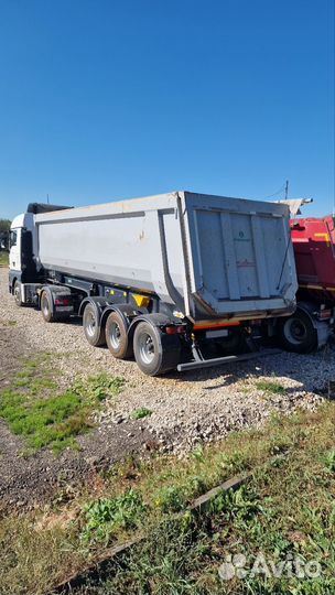 Полуприцеп самосвальный Grunwald 9453-0000010-50, 2020