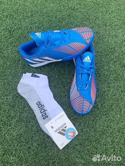 Бутсы футбольные сороконожки