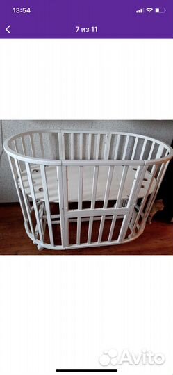 Детская кроватка с маятником