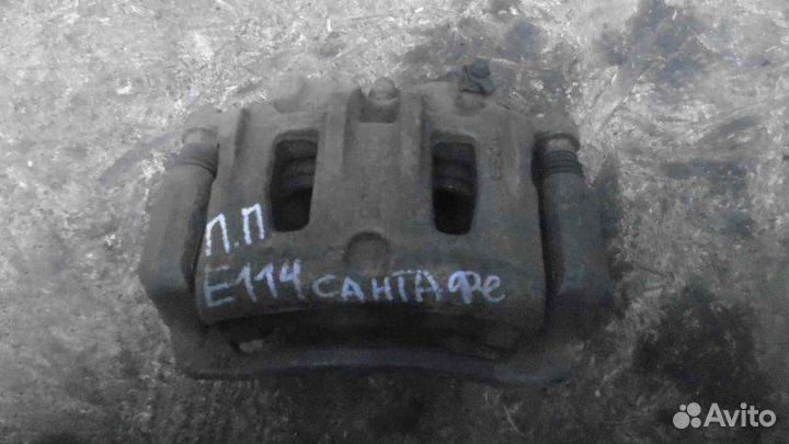 Суппорт передний правый Hyundai Santa Fe 2 2.2