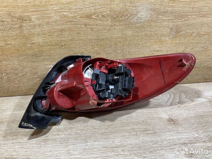 Фонарь задний левый Peugeot 206 CC Арт. 111474