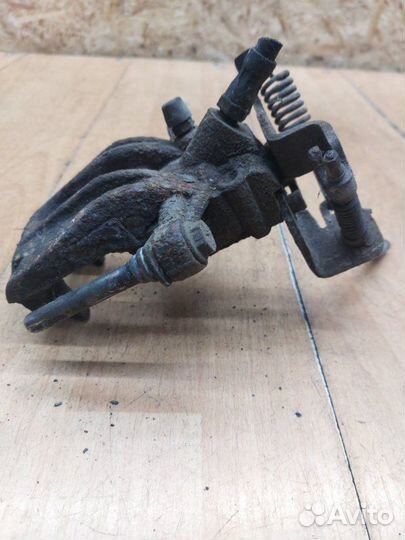 Тормозной суппорт задний левый Ford Mondeo cjba