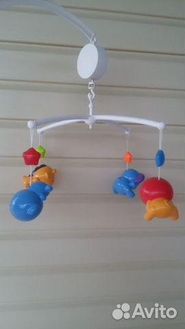 Музыкальная карусель с заводным механизмом