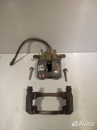 Суппорт передний правый Nissan Almera G15 седан