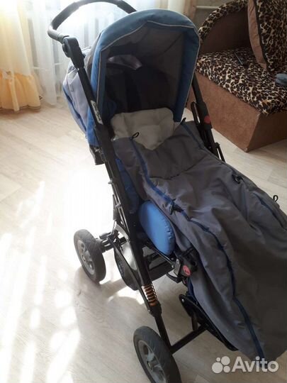 Коляска для детей с дцп