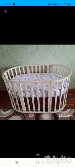 Детская кроватка с маятником