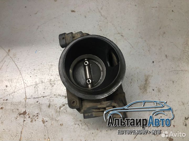 Дроссельная заслонка Renault Logan