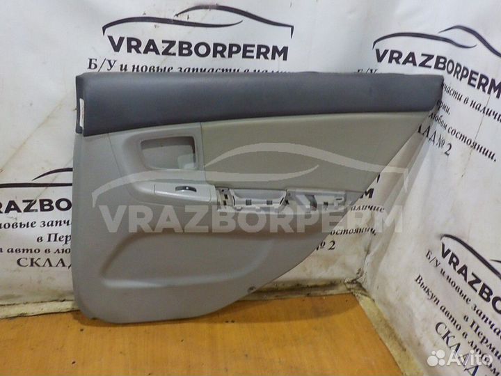 Обшивка двери задней правой (дверная карта) Kia Ce