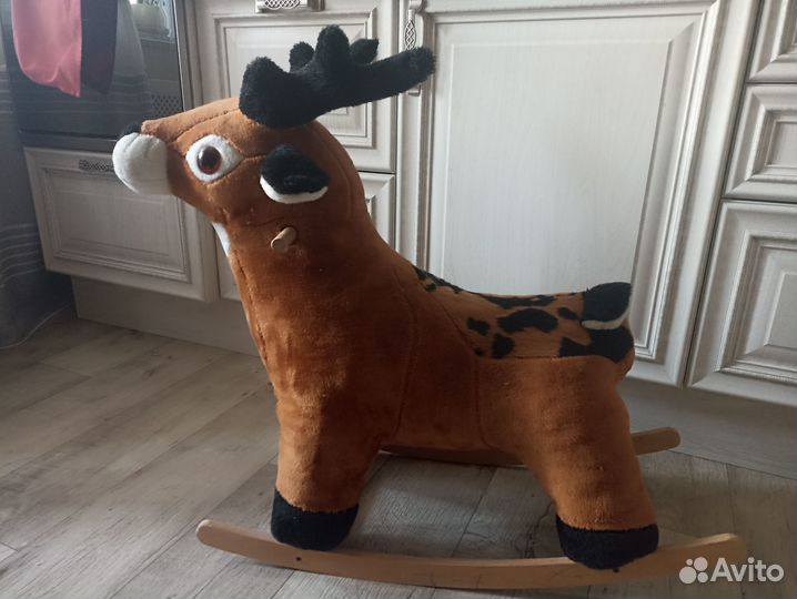 Детская игрушка качалка