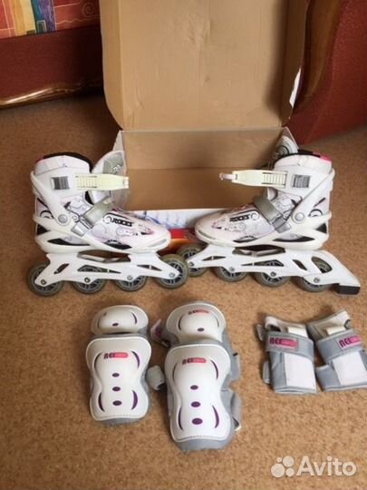 Роликовые коньки