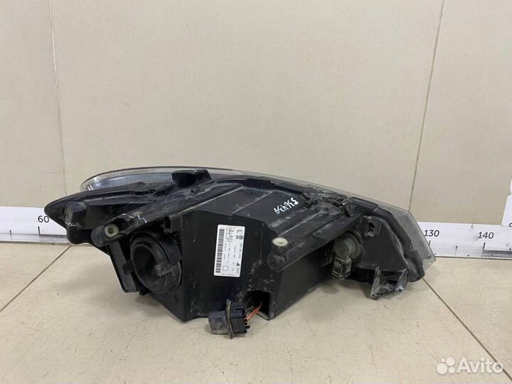 Фара левая Volkswagen Polo Sed RUS 2011