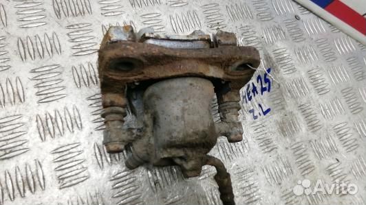 Суппорт тормозной задний левый toyota RAV 4 ZSA3