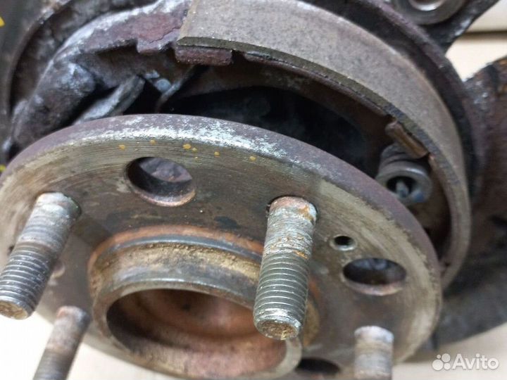 Кулак задний левый Kia Sportage 3 SL 2wd