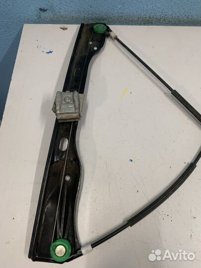 VW Passat B7 стеклоподъемник передний левый