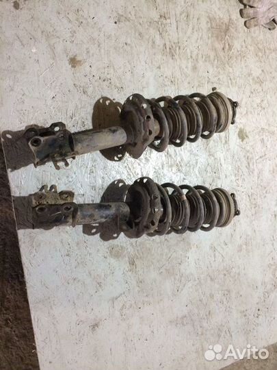 Стойки передние Opel Astra H