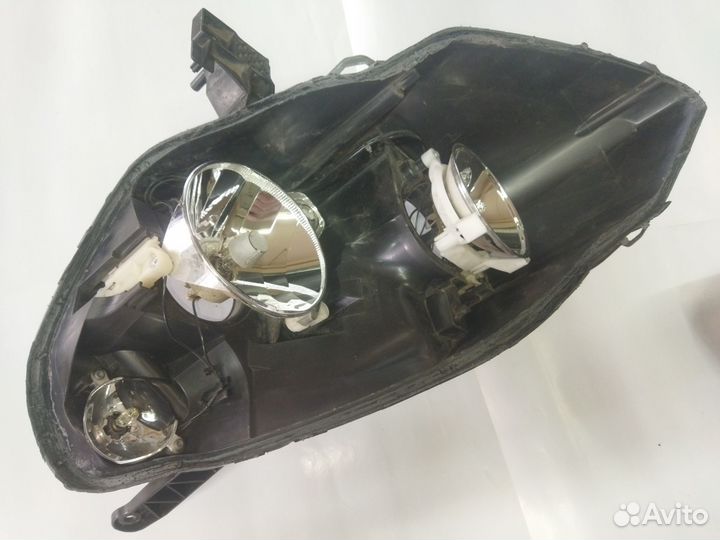 Фара левая Opel Zafira B 2005-2012