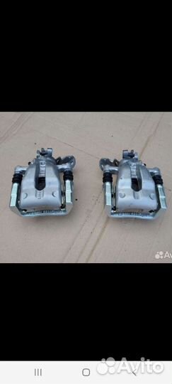 Суппорт тормозной Opel Astra H G Zafira A B