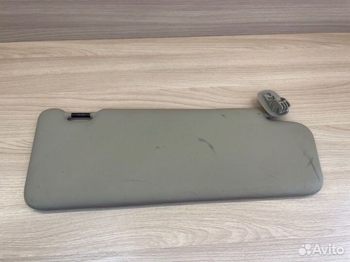 Козырек солнцезащитный левый Renault Logan