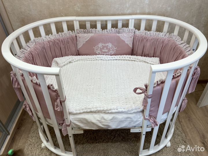 Детская кроватка с поперечным маятником