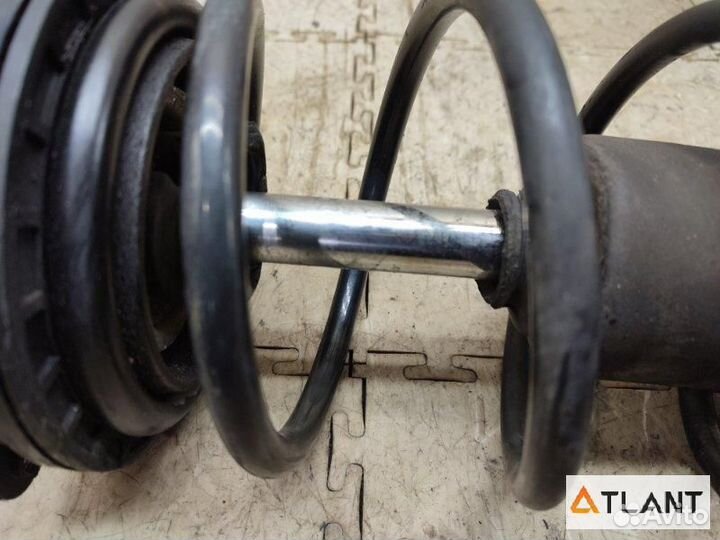 Стойка передняя левая nissan march