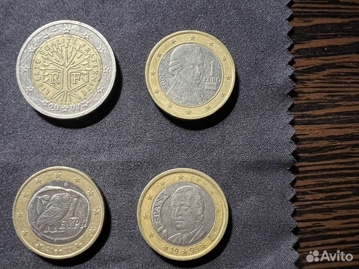 Монеты 2 евро, квотеры, доллары Канады