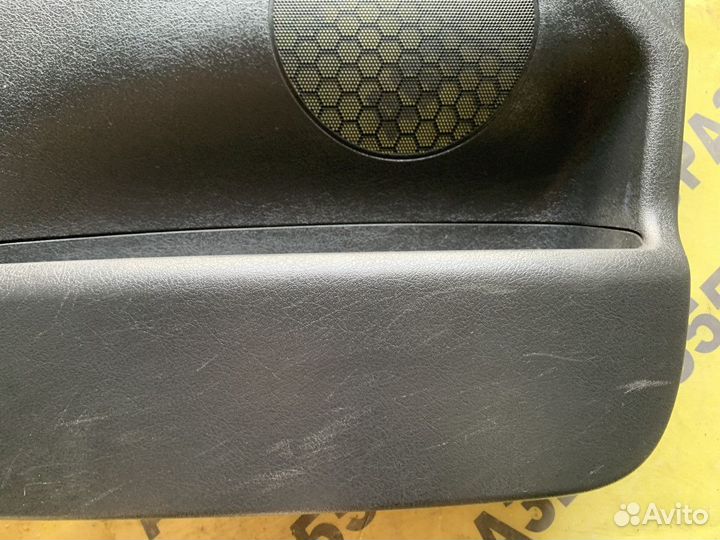 Обшивка двери передней левой Peugeot 207