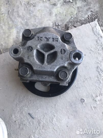 Насос гур Mazda 323