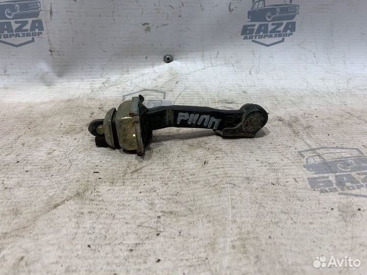 Ограничитель двери передний правый Nissan Primera