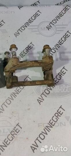 Скоба суппорта заднего Opel Astra H за штуку