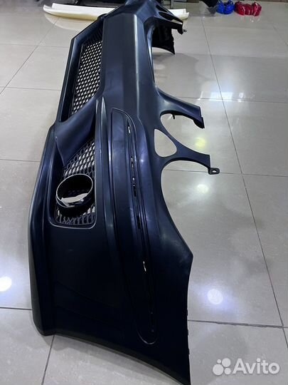 Передний бампер е211-63 амг