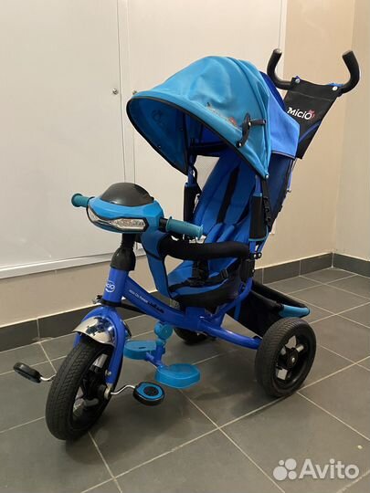 Трехколесный велосипед с ручкой