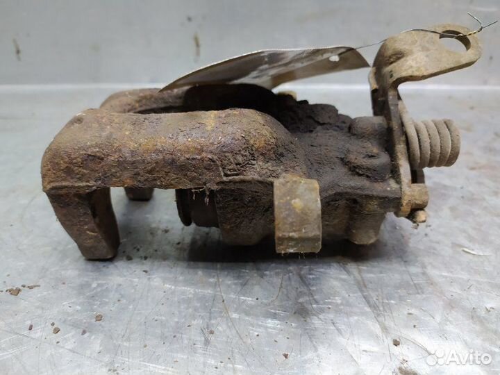 Суппорт тормозной задний правый Skoda Octavia (A5