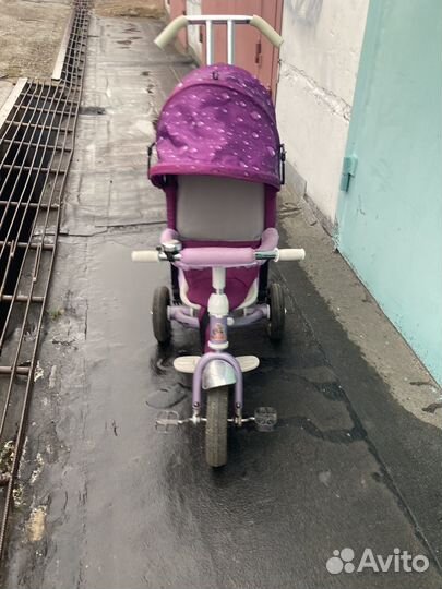 Трехколесный велосипед с ручкой