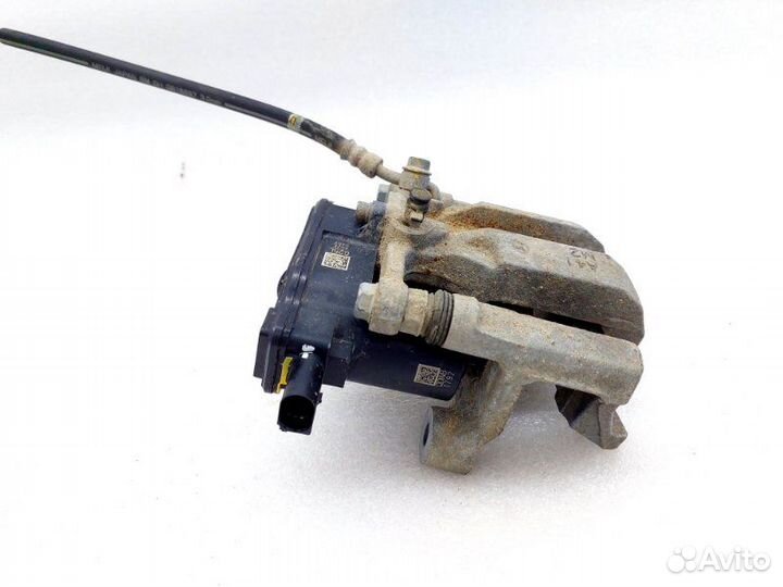 Суппорт тормозной задний левый Hyundai Santa Fe TM