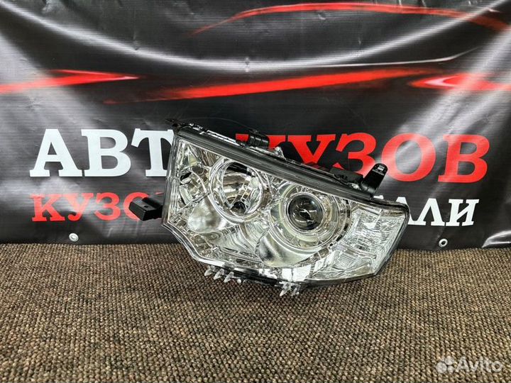 Фара левая Mitsubishi Pajero Sport 2008