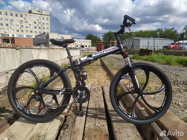 Велосипед на литых дисках 26