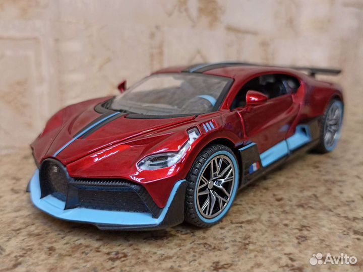 Bugatti Divo красный в масштабе 1 32