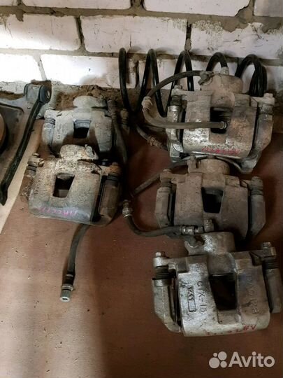 Передний тормозной суппорт Шевроле лачетти