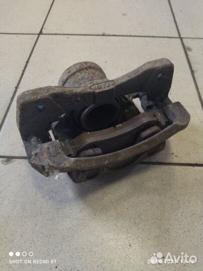 Суппорт тормозной передний левый Chevrolet Lacetti