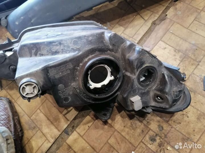 Фара левая на Peugeot 206