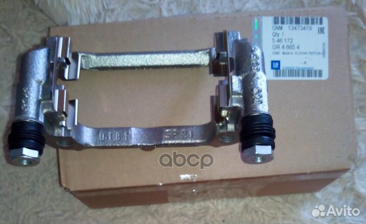 Скоба заднего суппорта левая / opel AstraJ GM G