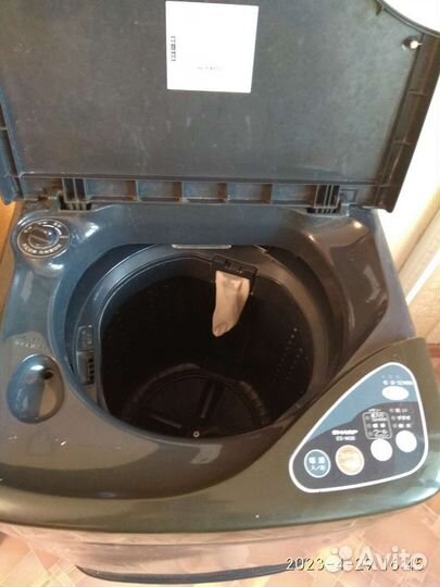 Стиральная машинка с вертикальной загрузкой