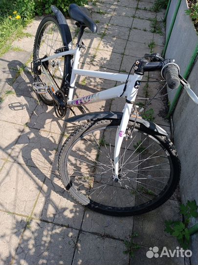 Женский велосипед B'twin Rockrider 300 (2015)