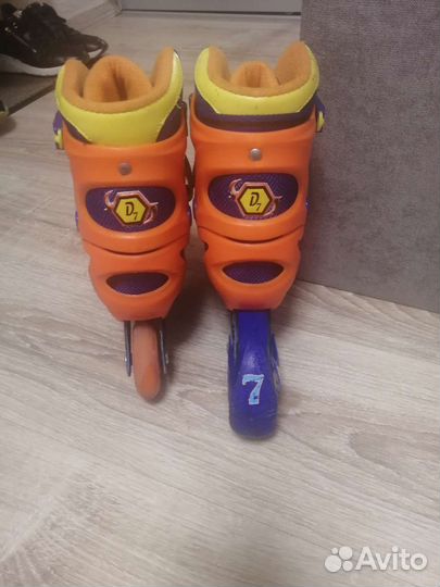 Роликовые коньки