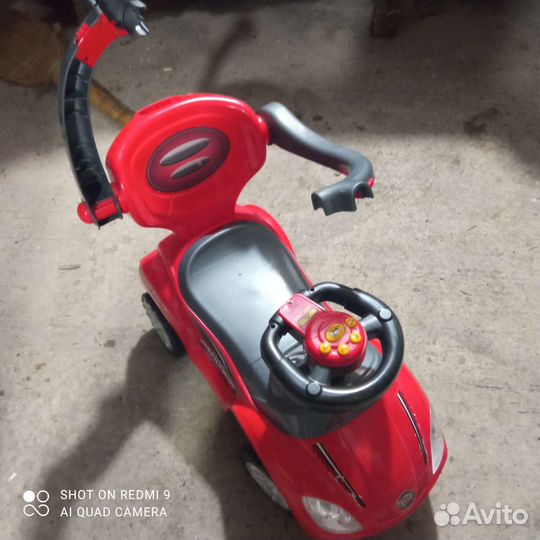 Машинка-каталка музыкальная