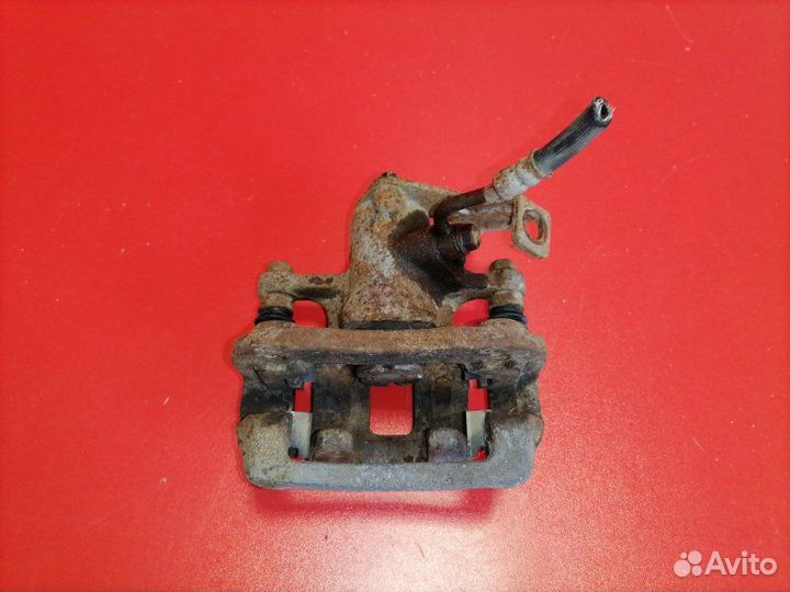 Суппорт задний левый Hyundai Solaris RB G4FA 2011